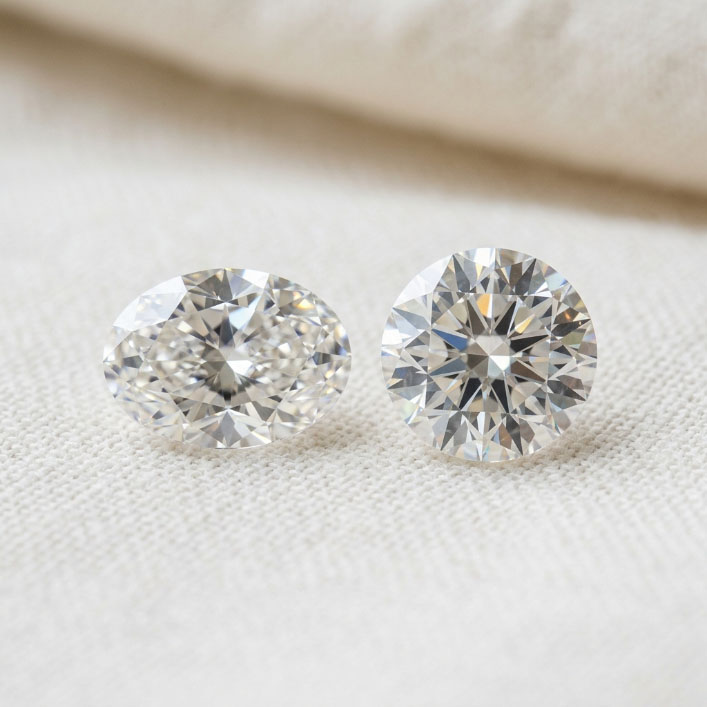 Oval and round lab grown diamonds compared for face-up visual size.