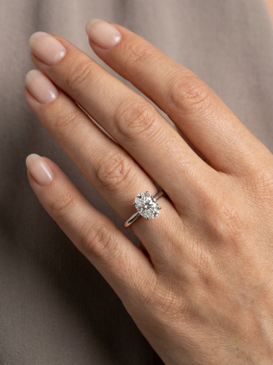 1 carat diamond ring on hand.