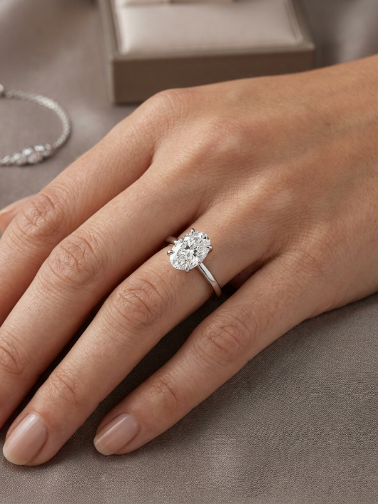 Diamond ring on hand for short fingers.
