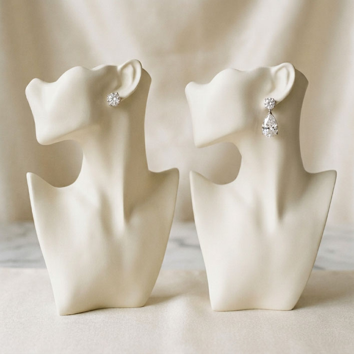 Diamond earrings for square and heart-shaped faces.