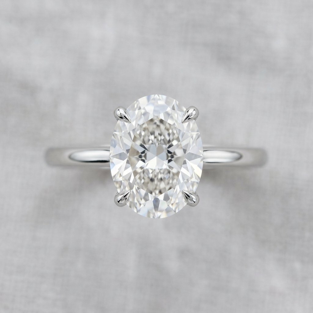 Top-down view of a hidden halo engagement ring appearing as a solitaire.