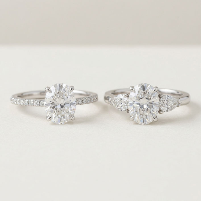 Oval pavé band ring and oval three-stone ring setting comparison.