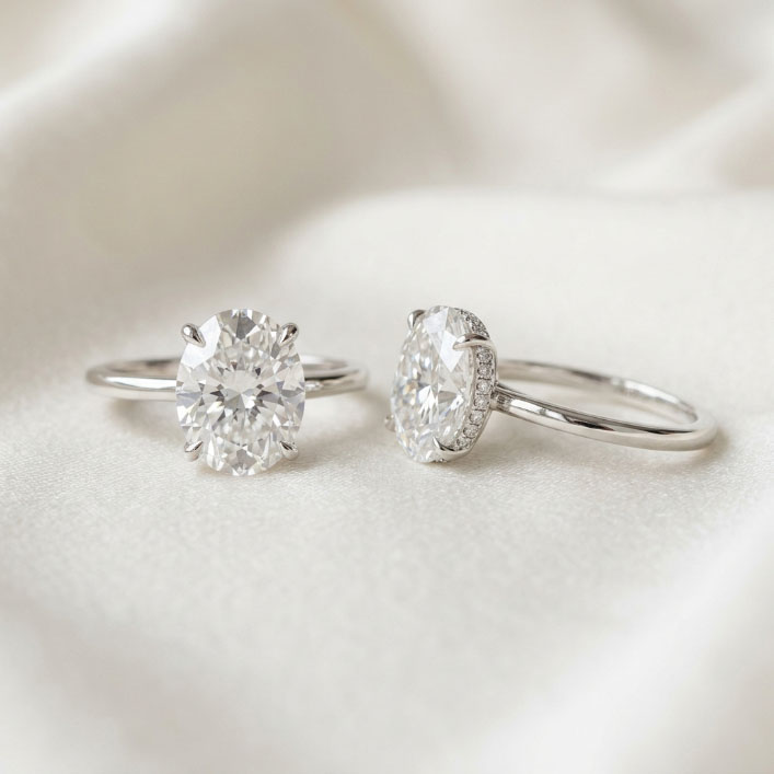 Oval solitaire ring and oval hidden halo ring setting comparison.