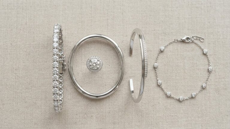 A tennis bracelet, bangle, cuff and chain bracelet displayed side by side.